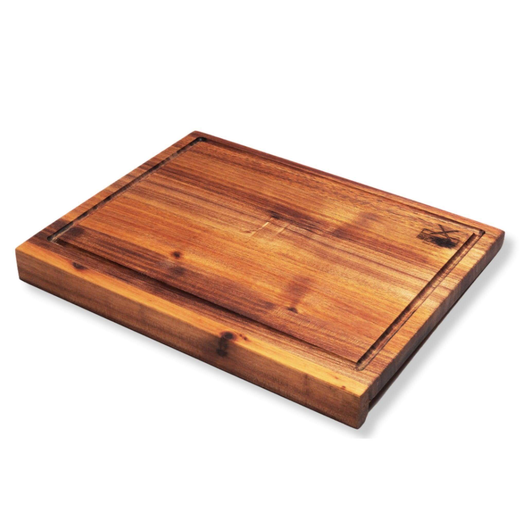Basic chopping board with juice groove and front lip for stability during meal prep.