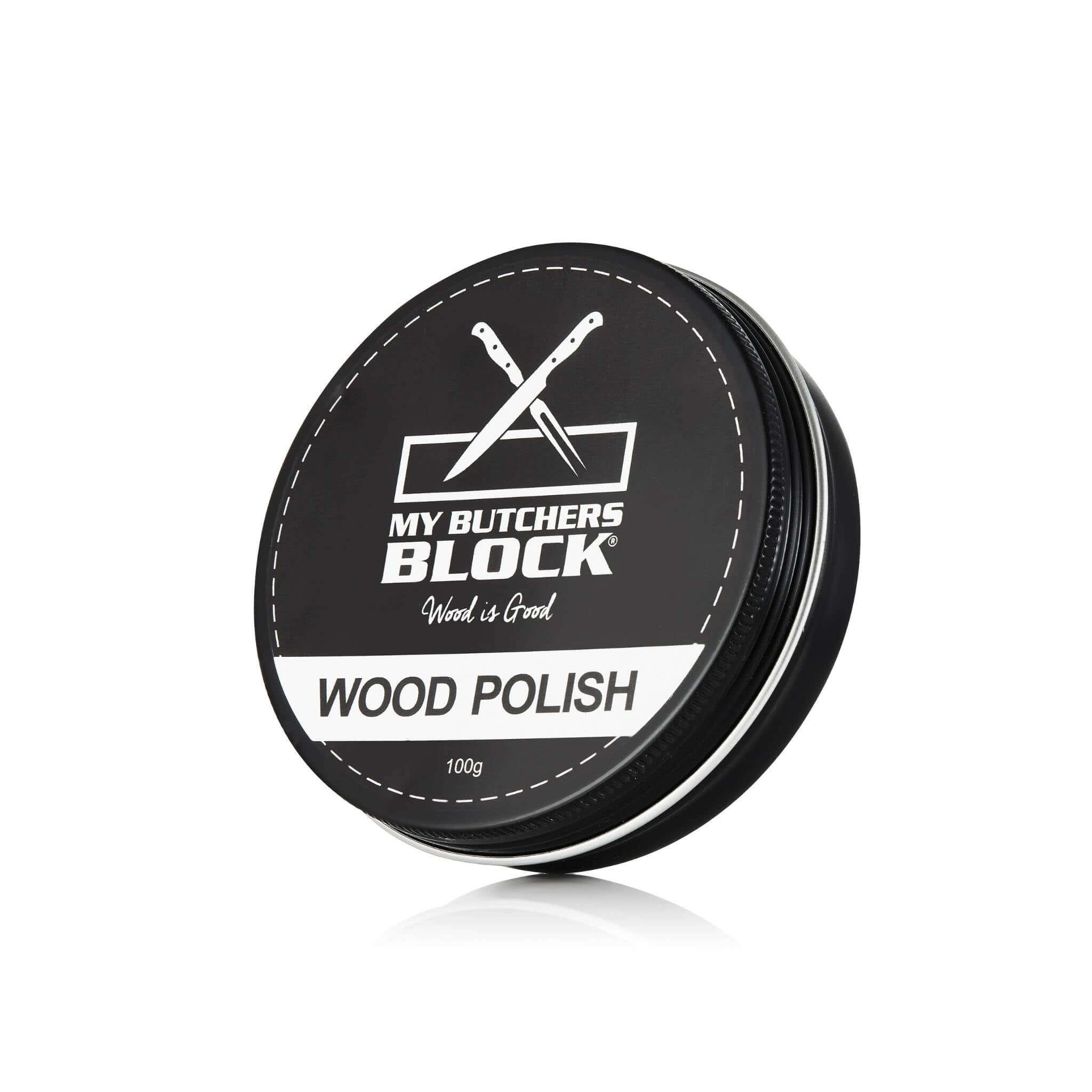 Eco-friendly wood polish in a black tin canister, perfect for nourishing and protecting wooden surfaces.