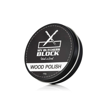 Eco-friendly wood polish in a black tin canister, perfect for nourishing and protecting wooden surfaces.