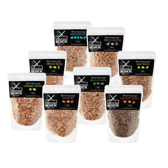 Variety of premium Smoking Wood Shavings in labeled pouches, ideal for enhancing flavors in grilling and smoking food.