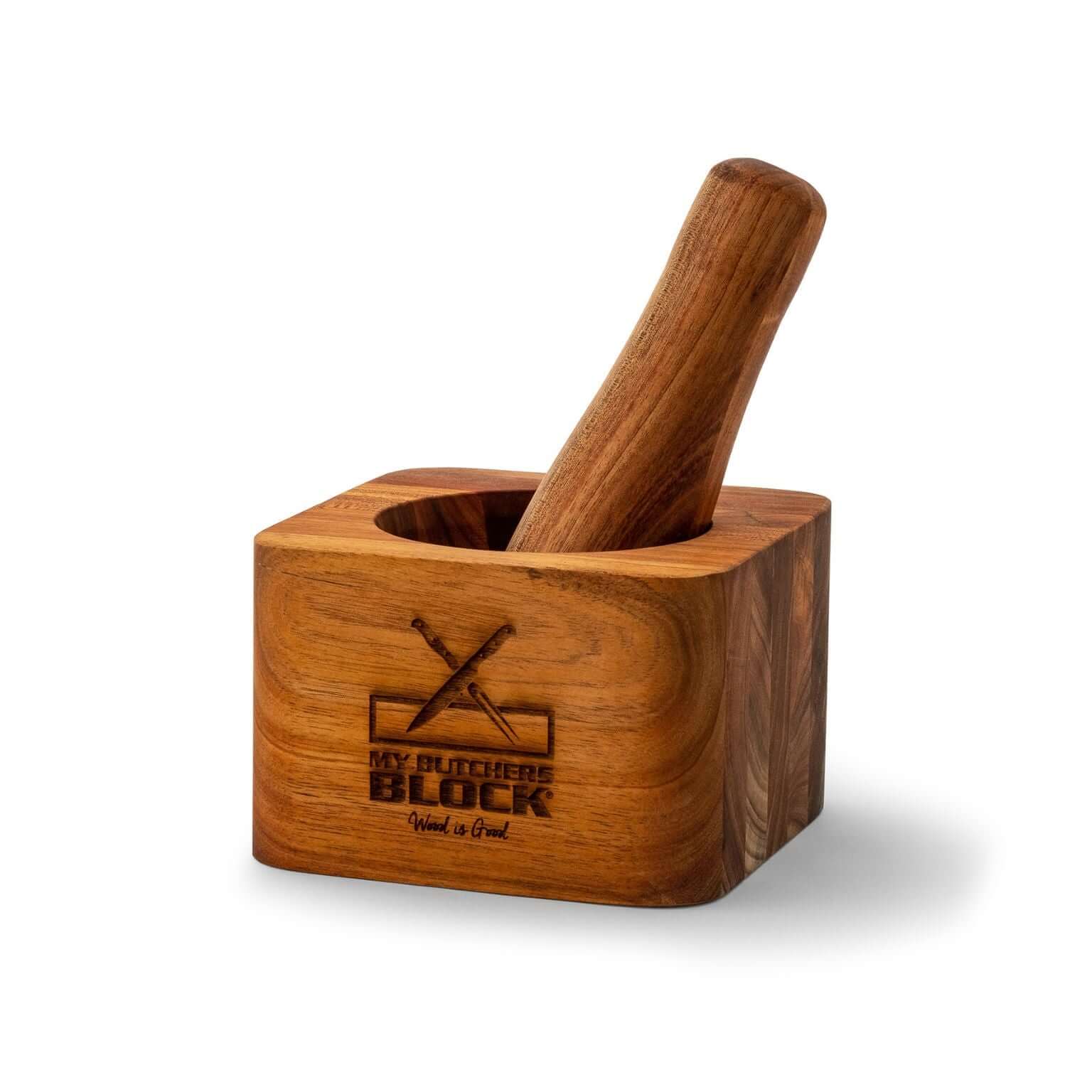 Premium wooden pestle and mortar for grinding and blending spices and herbs, featuring a rich acacia wood design.