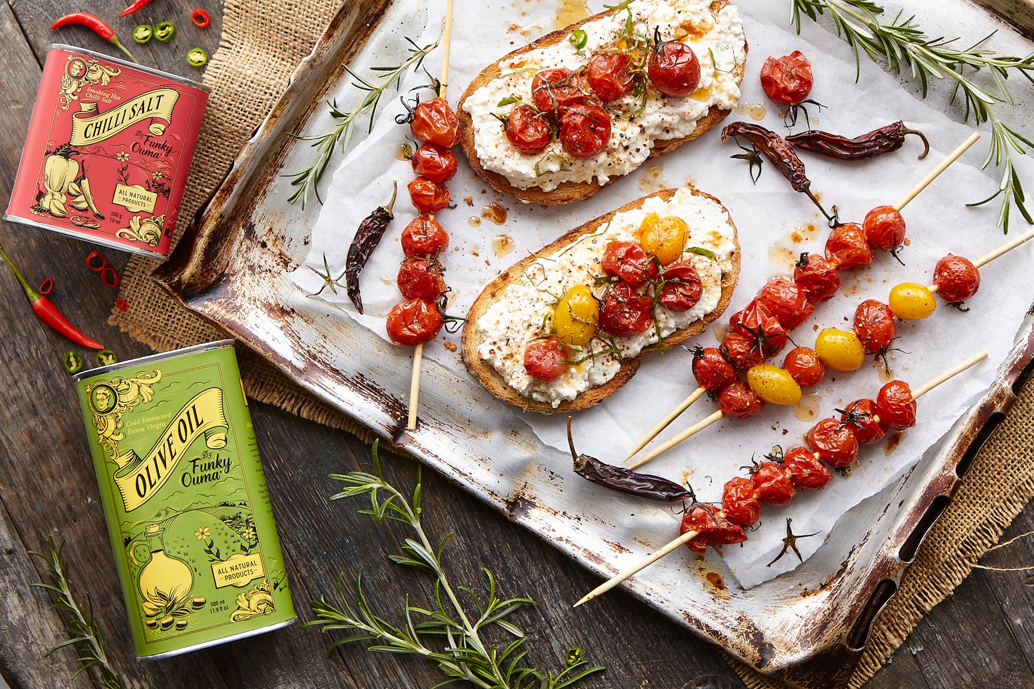 Delicious grilled skewers of cherry tomatoes with ricotta toast, featuring Chilli Salt and Olive Oil spice kits.