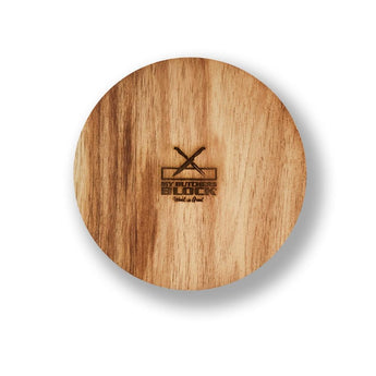 Top view of a round wooden cutting board featuring the engraved logo 'My Buddies Block'.