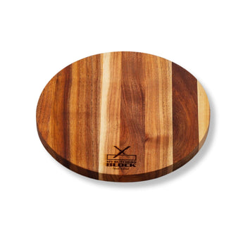 Basic Round Chopping Board made from natural wood, perfect for cutting and serving with an elegant design.