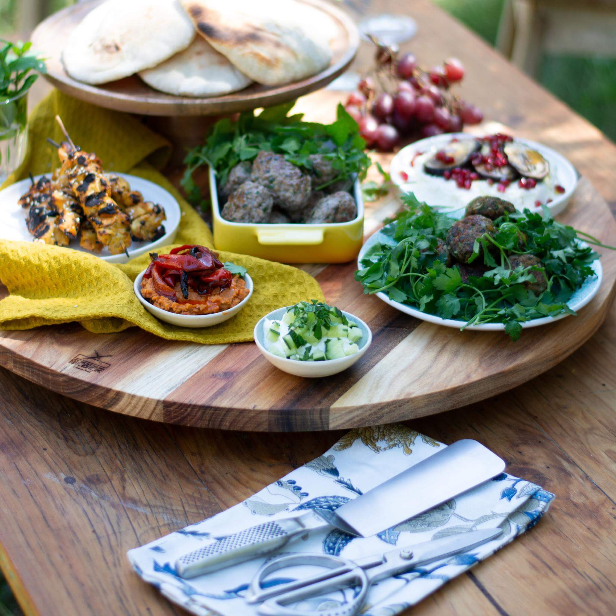 Elegant Lazy Susan 600mm with assorted dishes for effortless entertaining and stylish sharing.