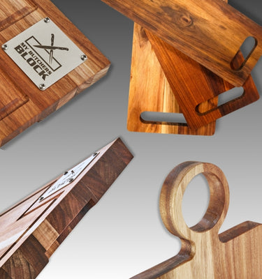 Various wood cutting boards and blocks showcasing unique designs and textures, ideal for cooking enthusiasts.