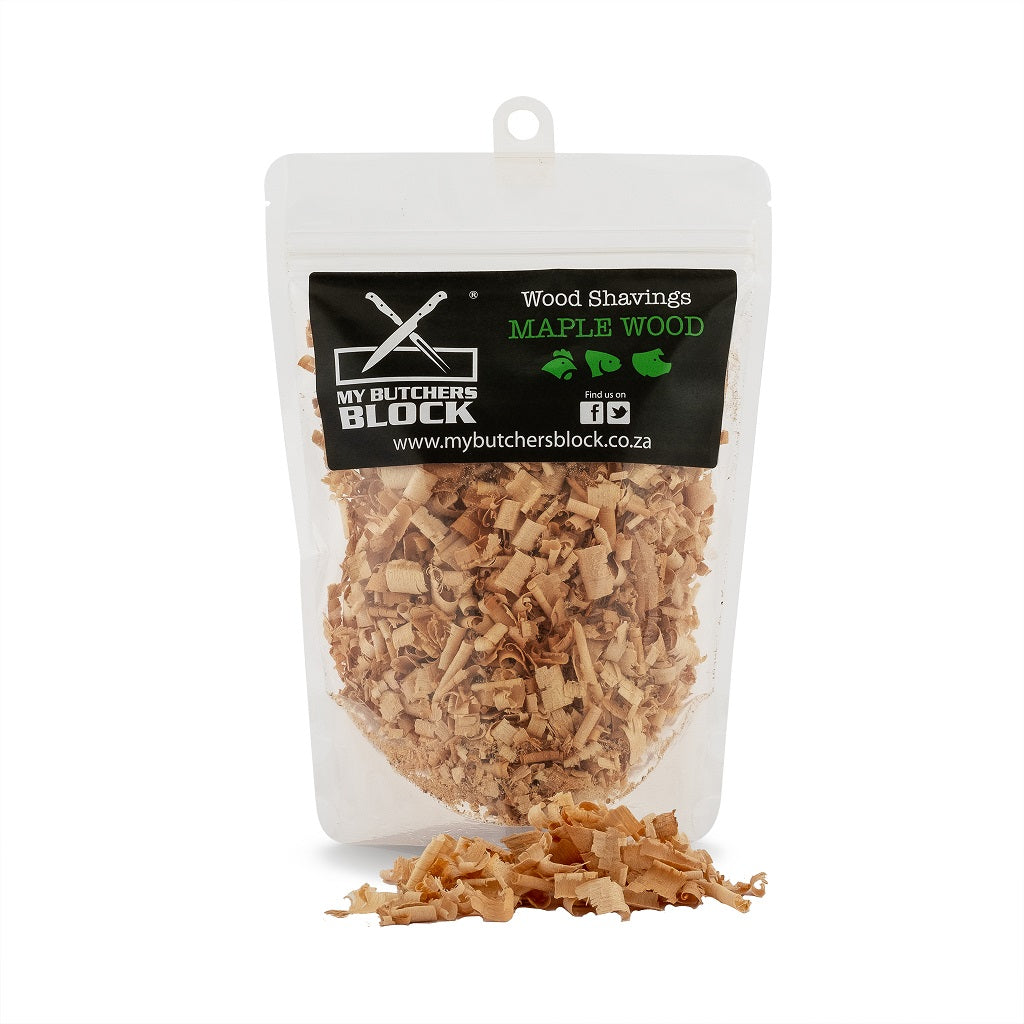 Premium maple wood shavings in a pack, perfect for enhancing smoky flavors in cooking and grilling.