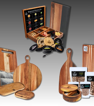 Botanical infusion box with wooden serving boards, spice jars, and assorted herbs, ideal for cooking enthusiasts.