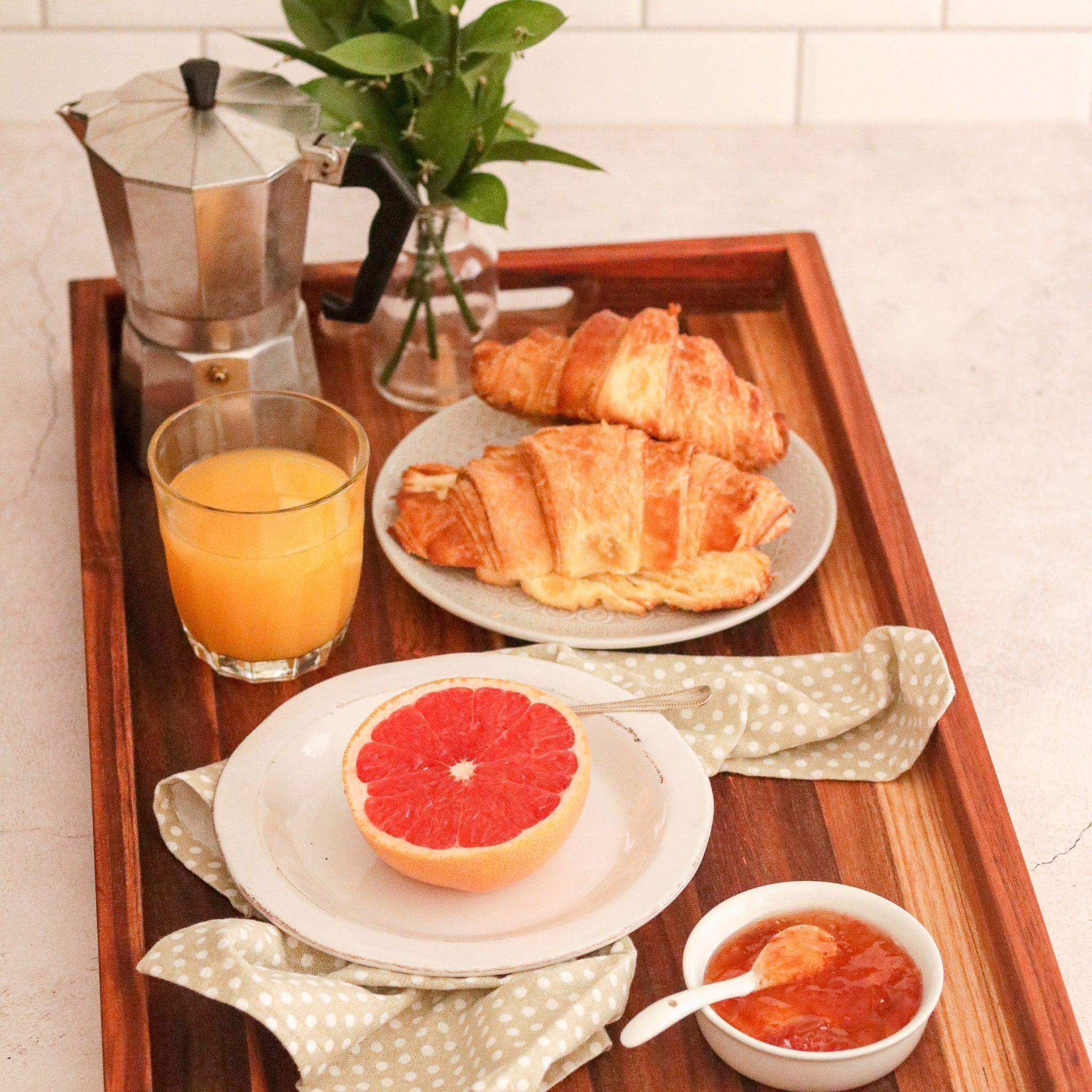 Croissants and juice on Large Wooden Serving Tray