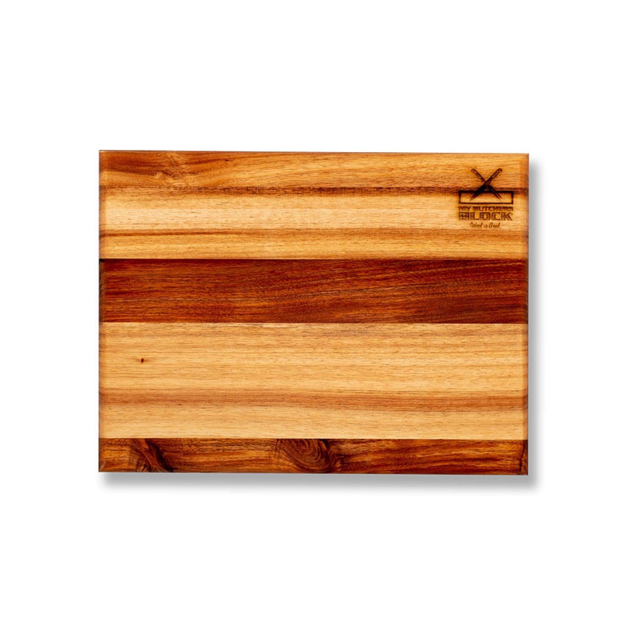 Basic Chopping Board Medium made of high-quality wood, featuring a durable and lightweight design for kitchen prep.