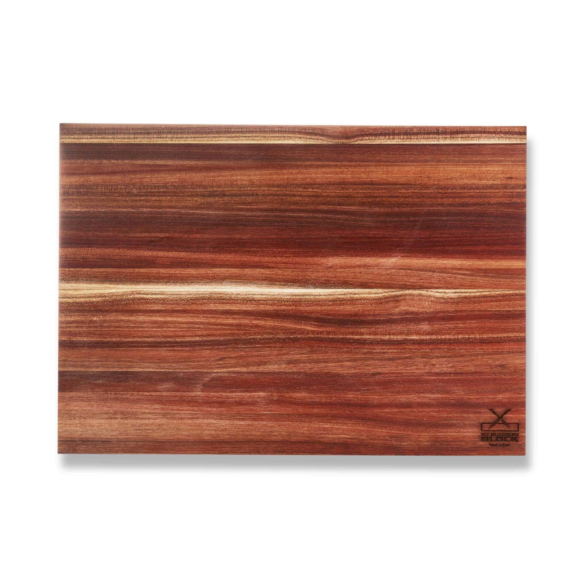 Large wooden chopping block with rich grain, perfect for slicing and prep in any kitchen.