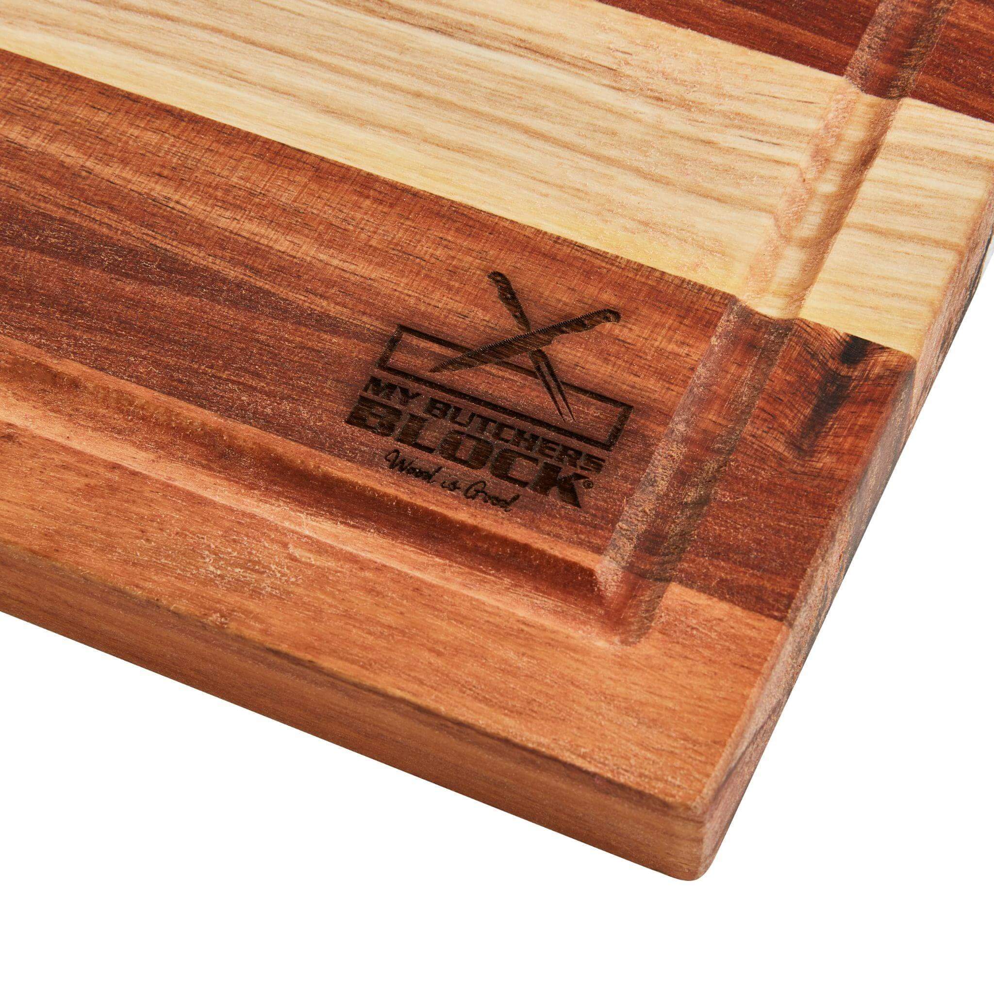 Large Slim Chopping Block with engraved logo, showcasing beautiful wood grain and practical design for kitchen tasks.