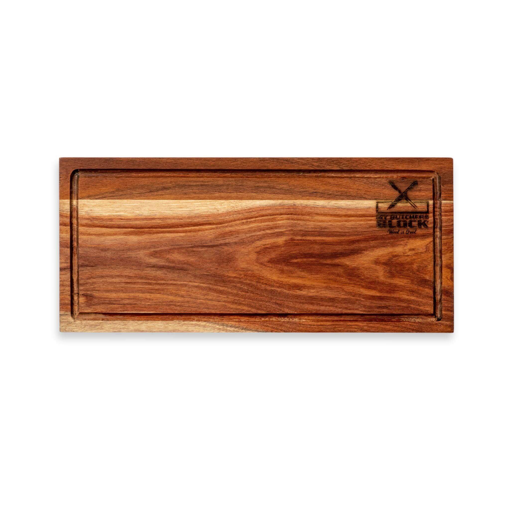 Large wooden steak board with juice groove for slicing and serving meat, crafted from high-quality wood.