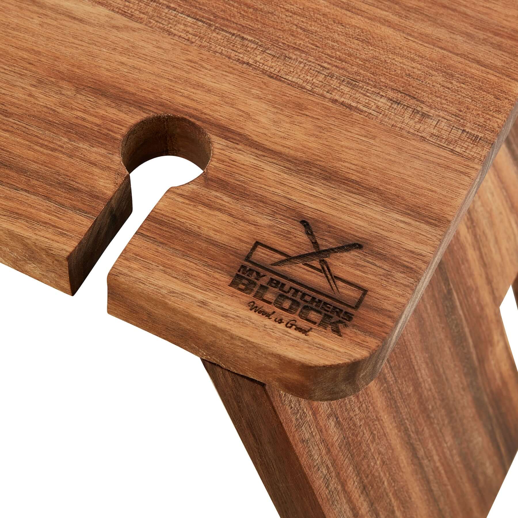 Close-up of My Butchers Block Grazing Table showcasing the wooden texture and branded logo, perfect for stylish hosting.