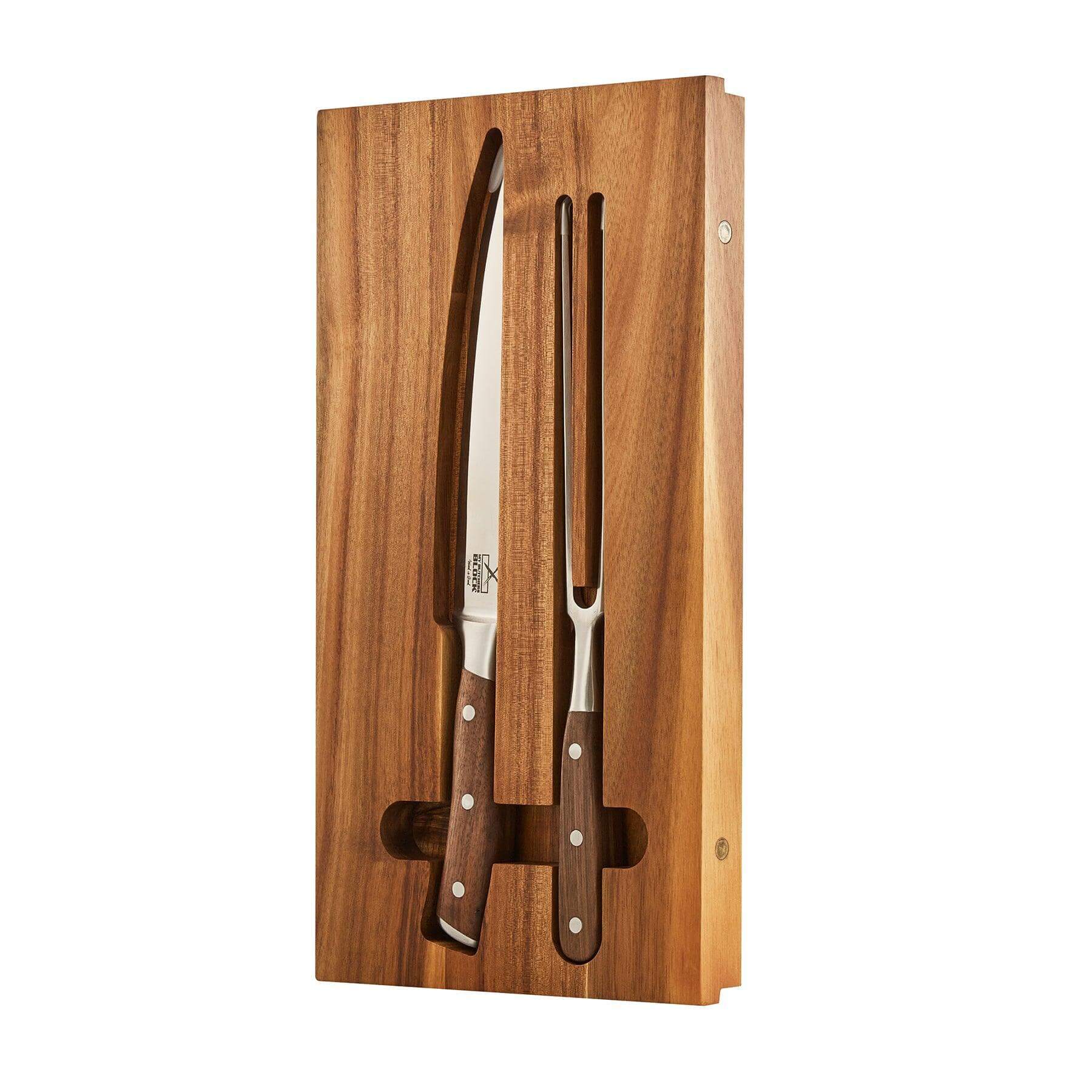 Chopping board set featuring a carving knife and fork in a wooden holder, perfect for kitchen prep and serving.