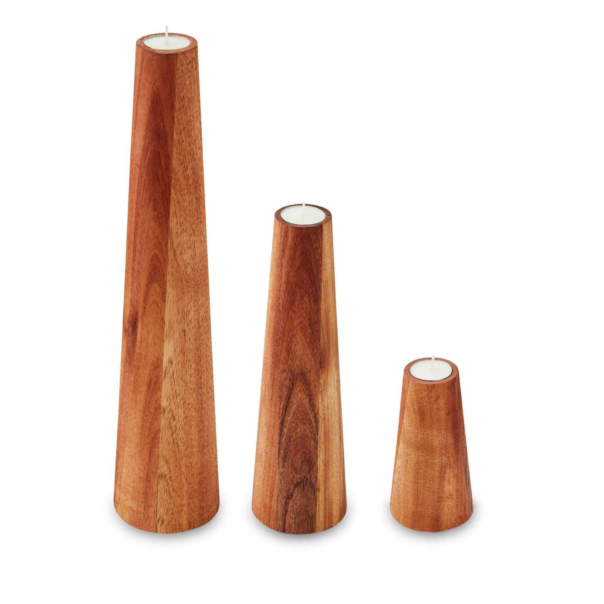 Set of three solid Blackwood candlesticks with rustic finishes in varying heights for Scandi-chic decor.