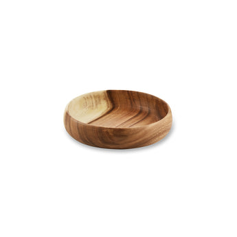 Small handcrafted round wooden bowl showcasing natural grain, perfect for serving and stylish storage.