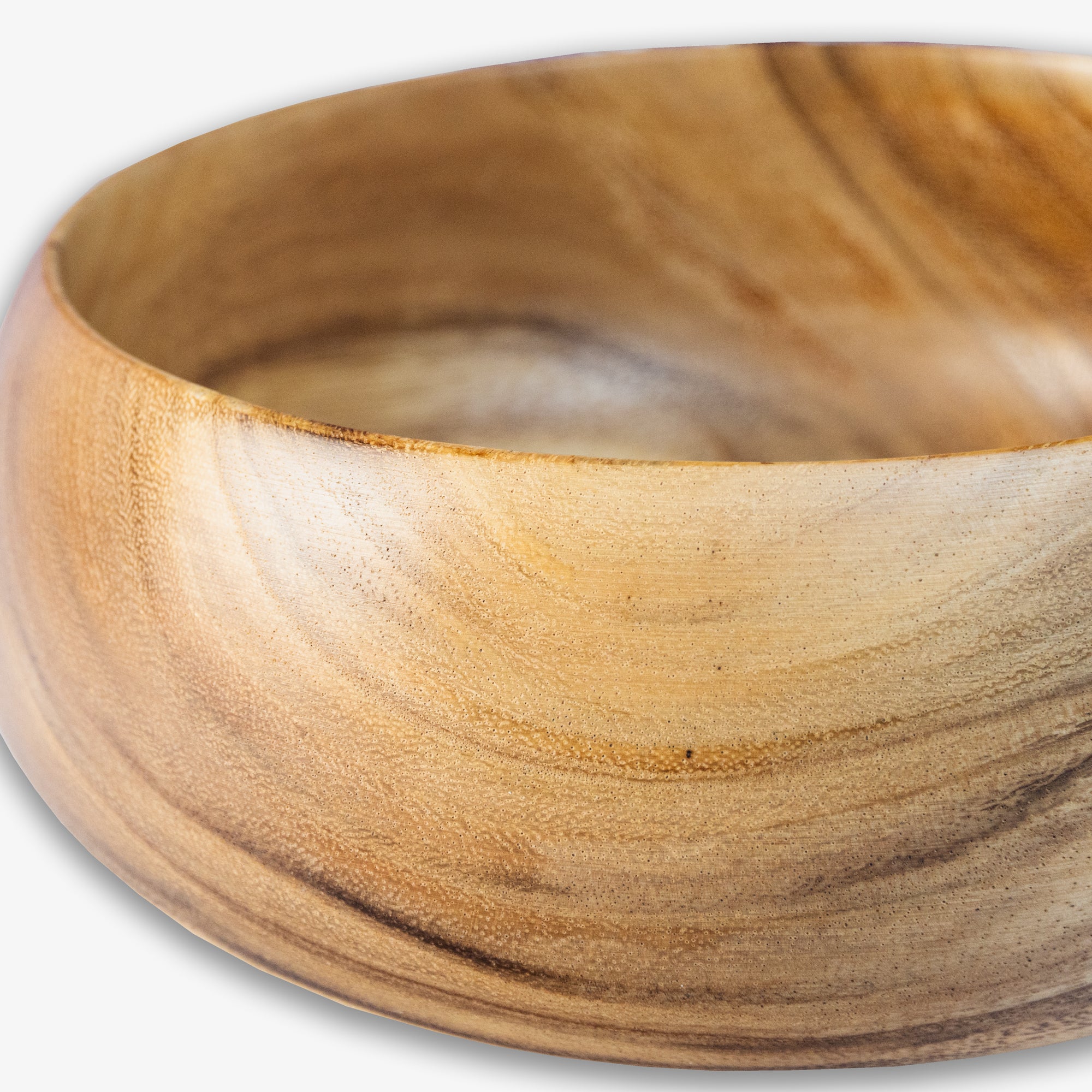 Handcrafted round wooden bowl showcasing natural grain and texture, perfect for stylish storage and serving.