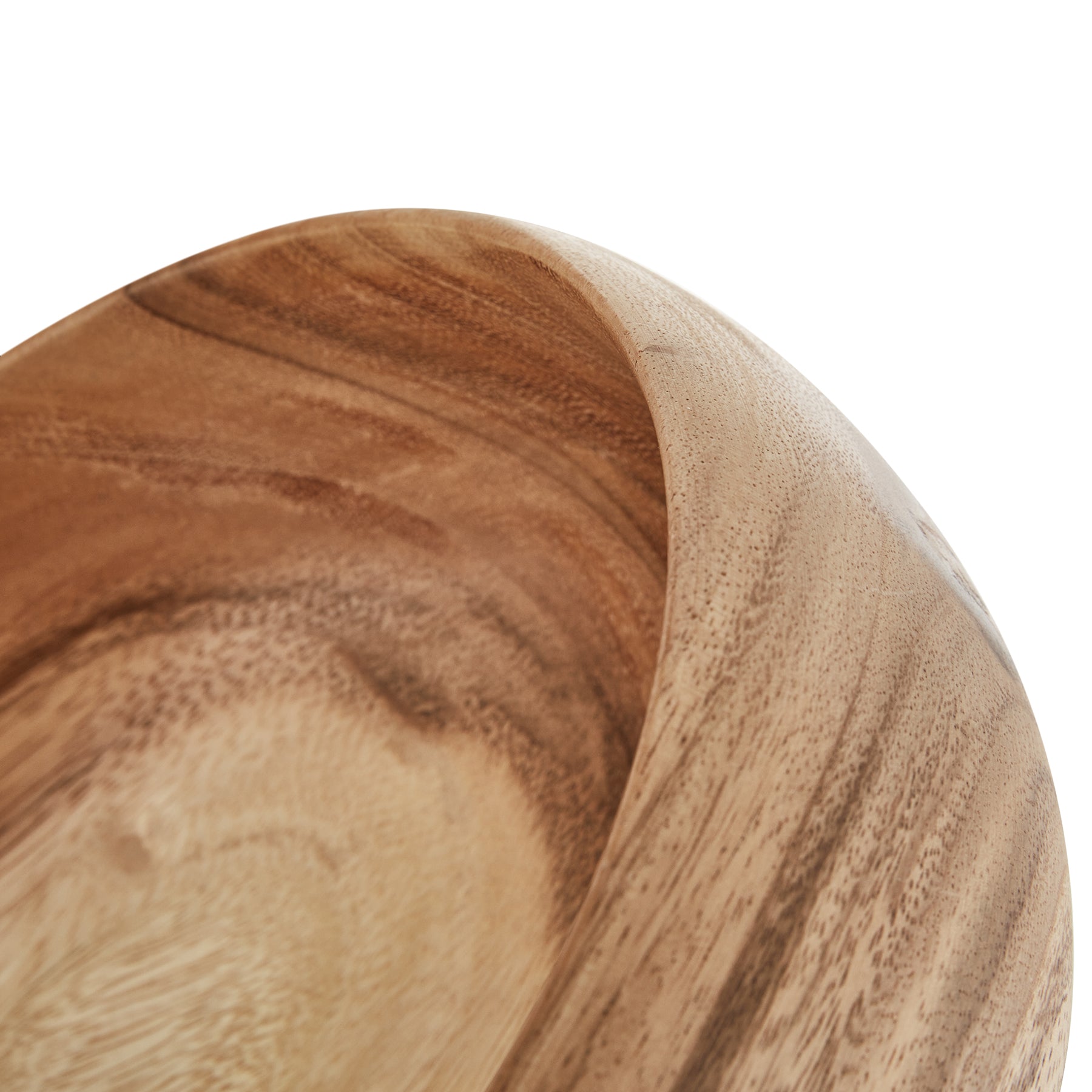 Close-up of handcrafted round wooden bowl highlighting natural grain and texture.