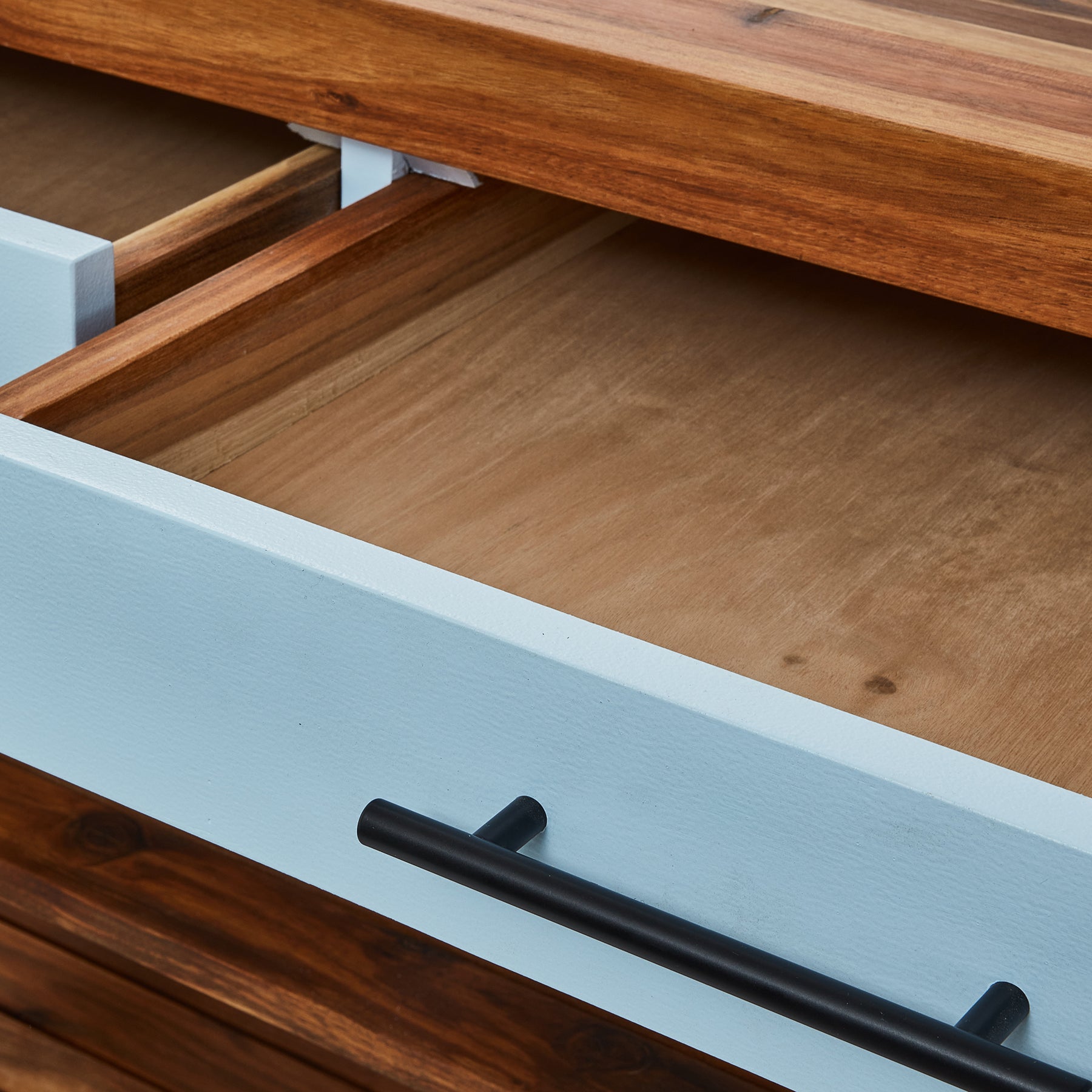 Open drawer of a Butcher's Bench showcasing spacious wooden interior and modern handles.