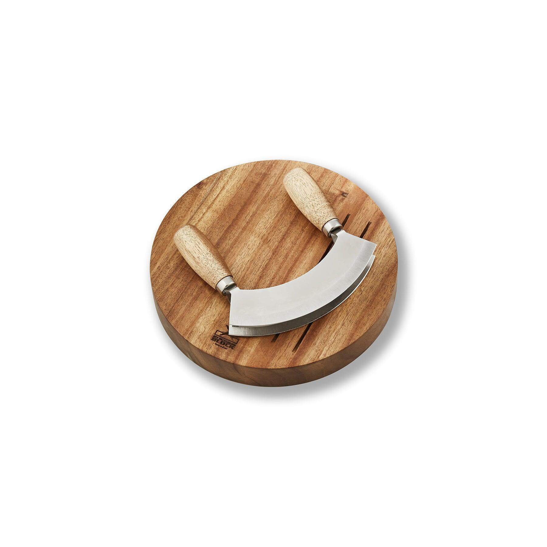 Mezzaluna herb chopper on wooden board; stylish and ergonomic kitchen tool for efficient herb preparation.