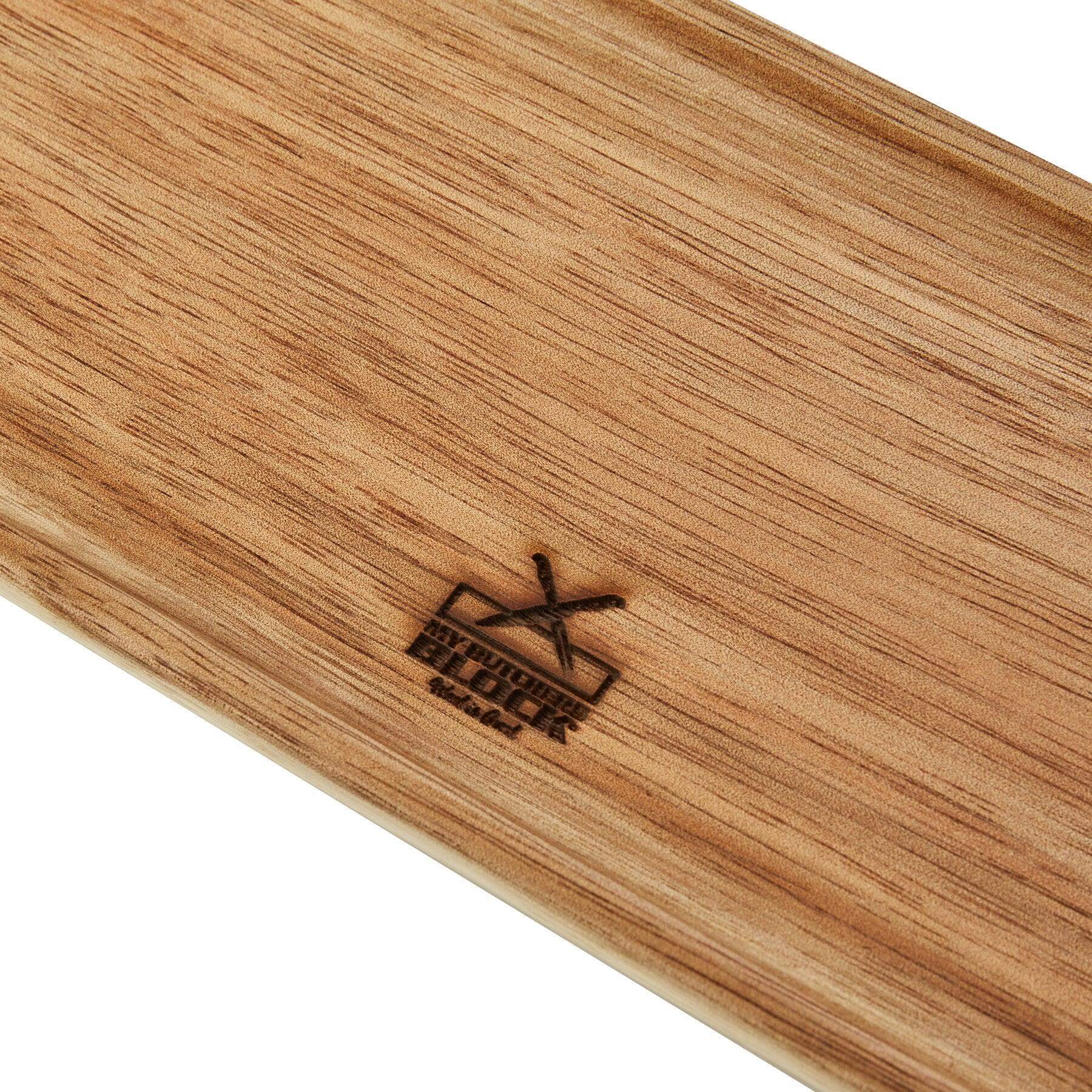 Close-up of a natural wood mini serving tray with raised edges and a branding logo.