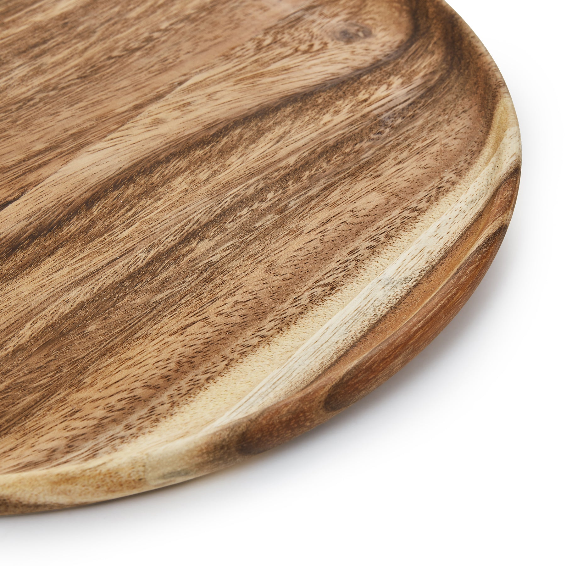 Close-up of a round wooden dinner plate showcasing Acacia wood texture and natural finish.