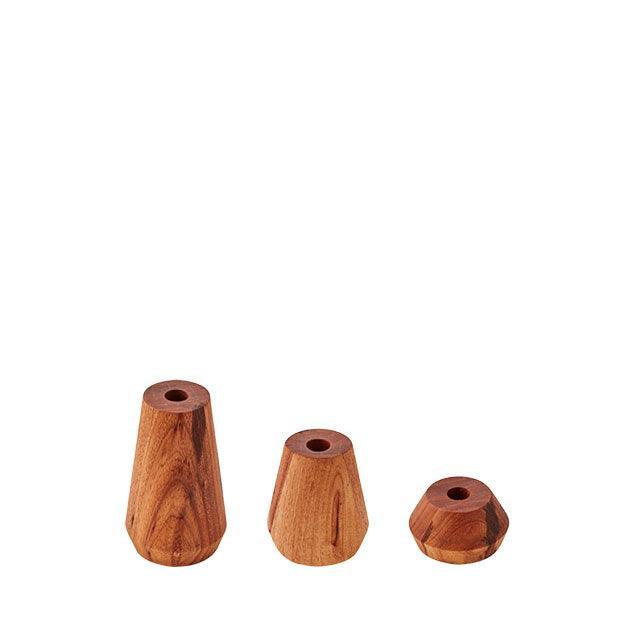 Vega medium solid Blackwood candle holder set showcasing three minimalist designs for chic decor.