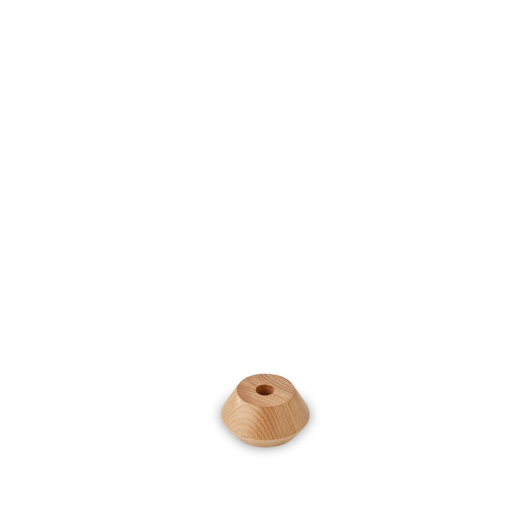 Small beechwood candlestick holder with rustic finish for minimalist decor.