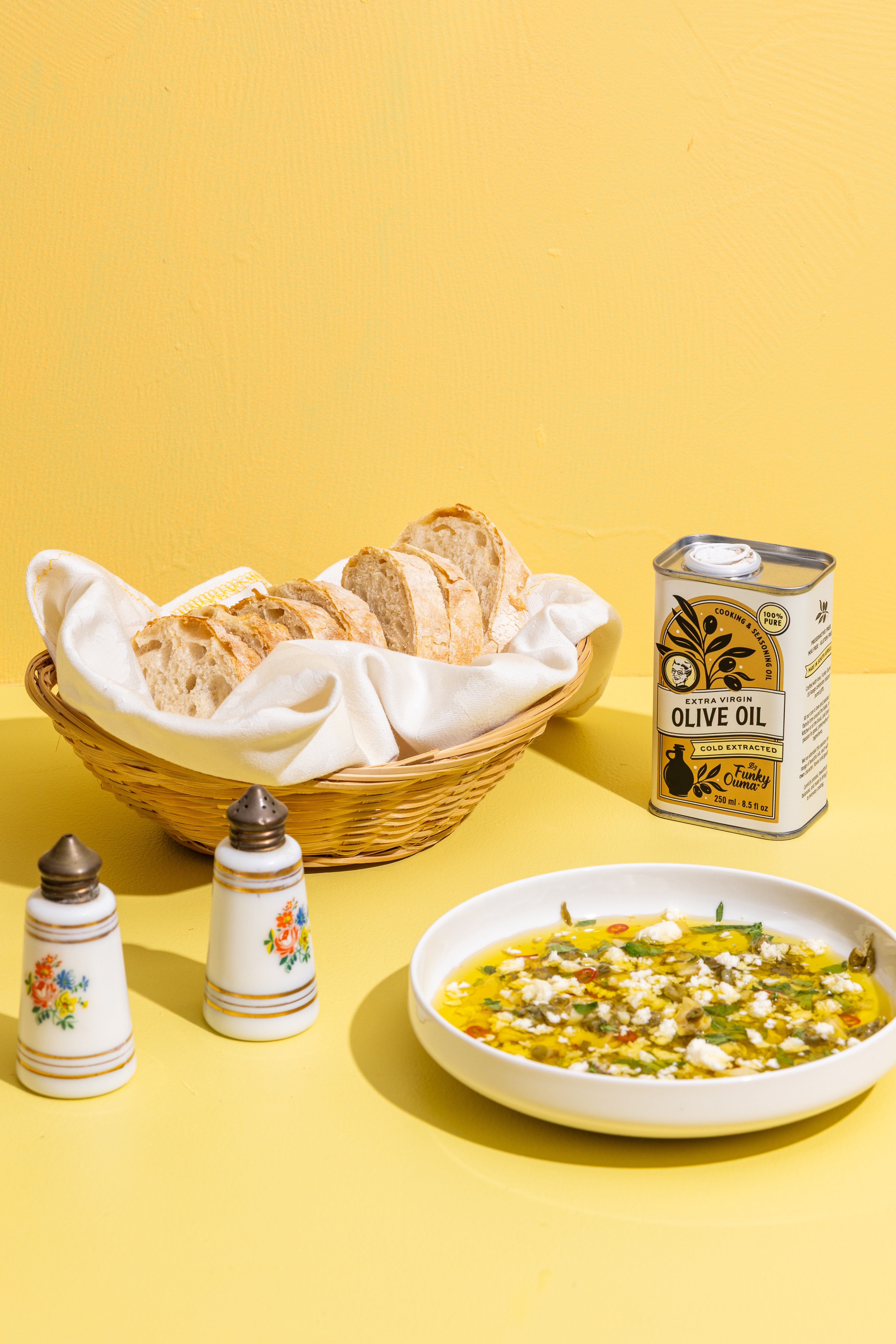 Funky Ouma Olive Oil 250ml - styled with ingredients