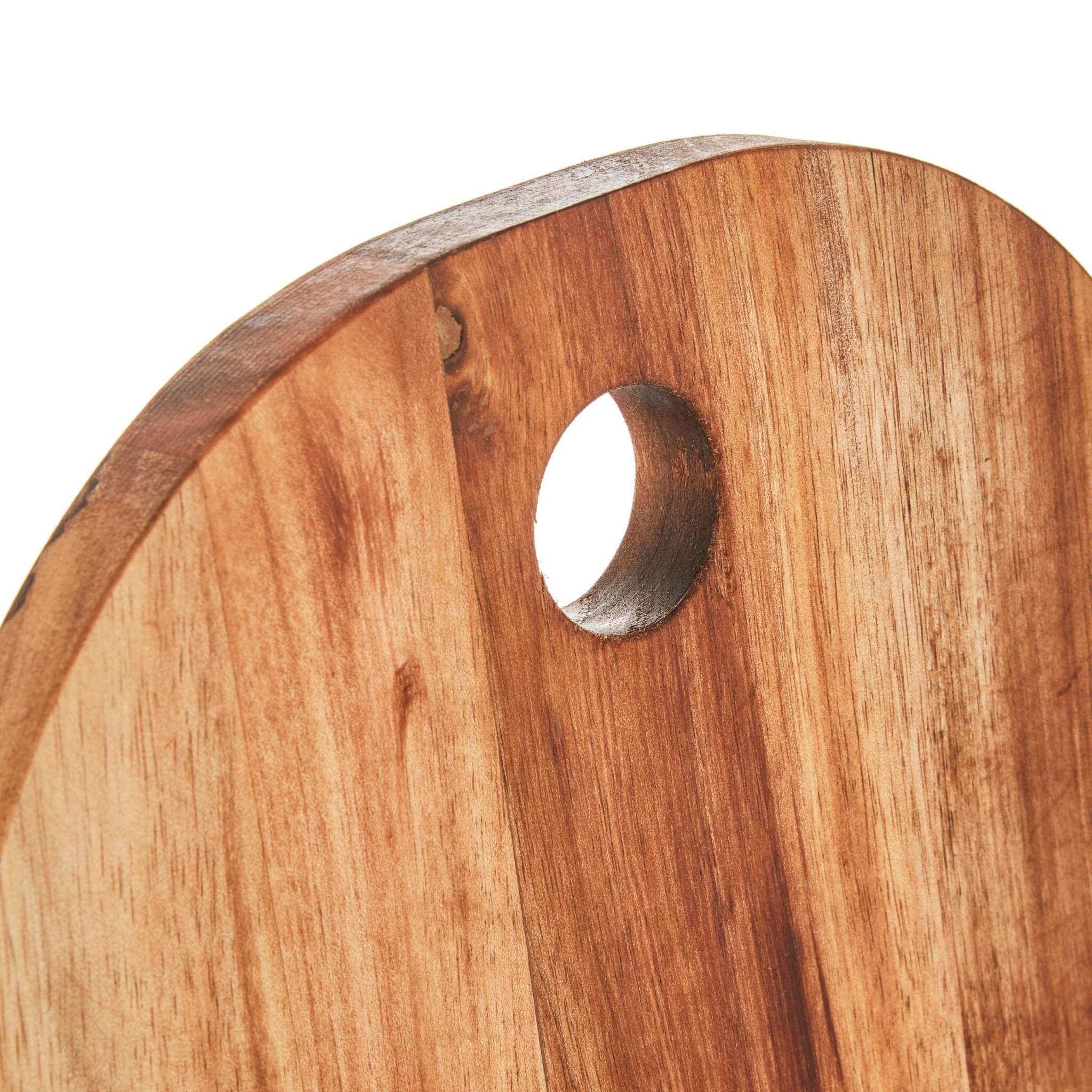 Close-up of the circular hole at the top of the Phat Serving Board, highlighting the smooth finish of the wood.