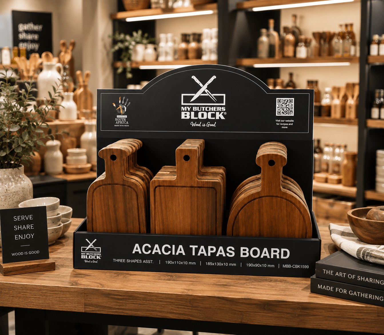 Three wooden acacia tapas boards displayed in a black retail counter box with the brand name My Butchers Block on the packaging.