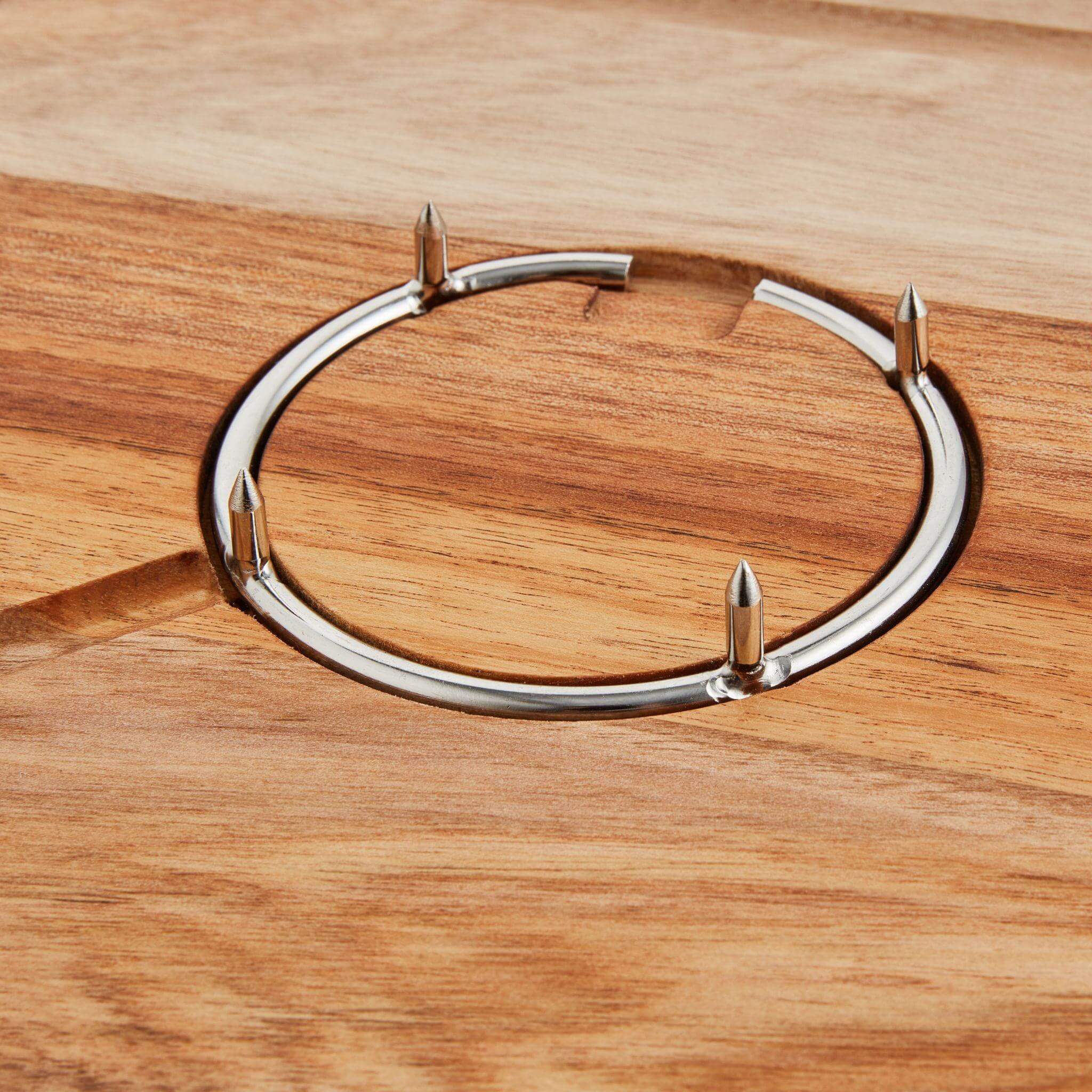 Close-up image highlighting the metal carving spike on the Carving Board.