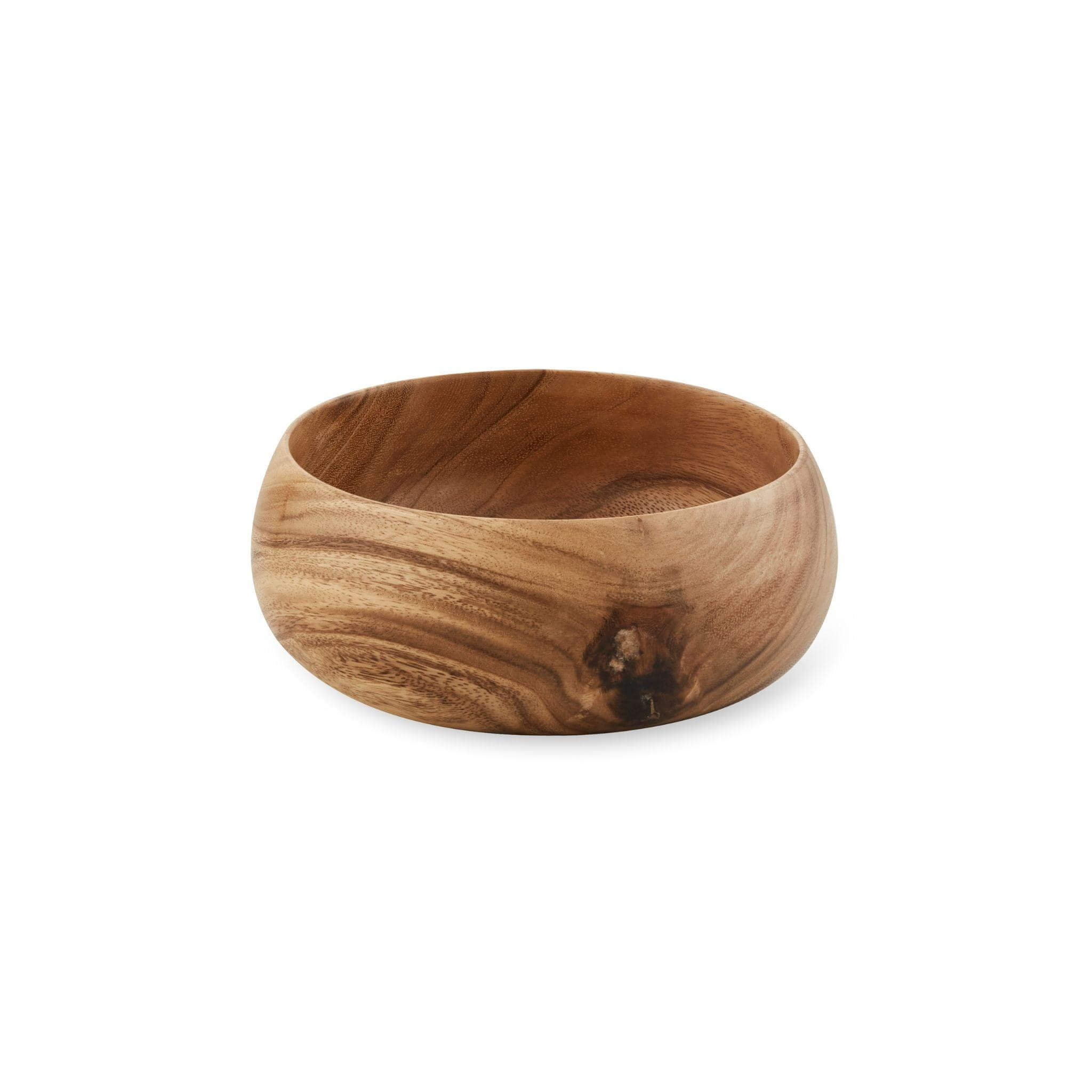Handcrafted small wooden bowl showcasing natural wood grain, perfect for serving snacks or decorative storage.
