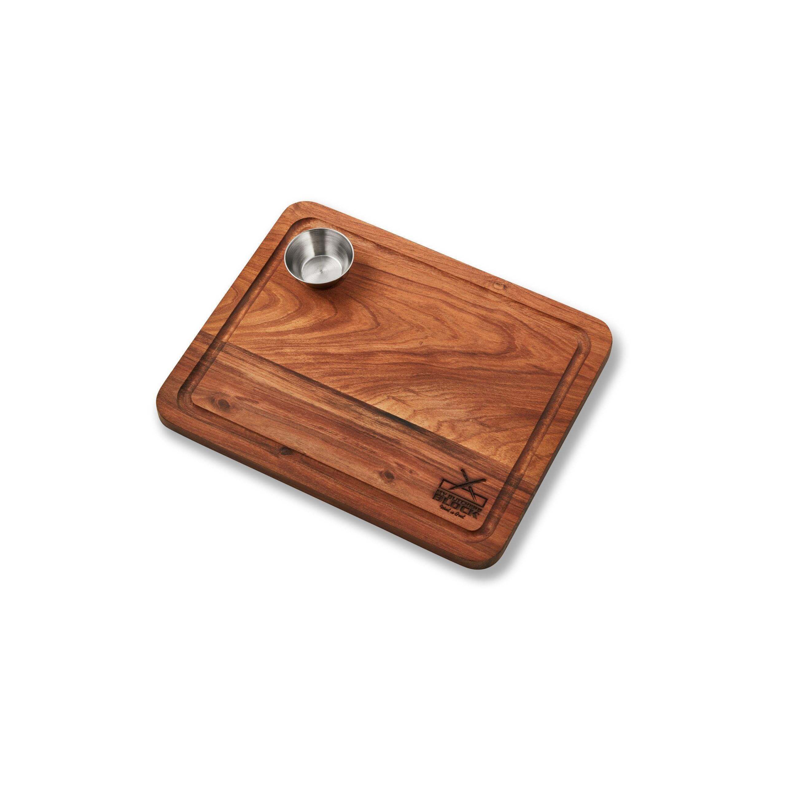 Acacia wood steak board with built-in sauce bowl and juice groove, perfect for grilling and serving steaks.