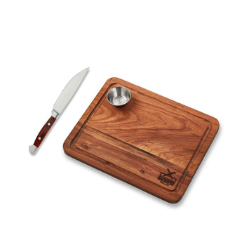 Mini Steak Night Combo Deal featuring a wooden steak board, metal sauce bowl, and a sharp steak knife.