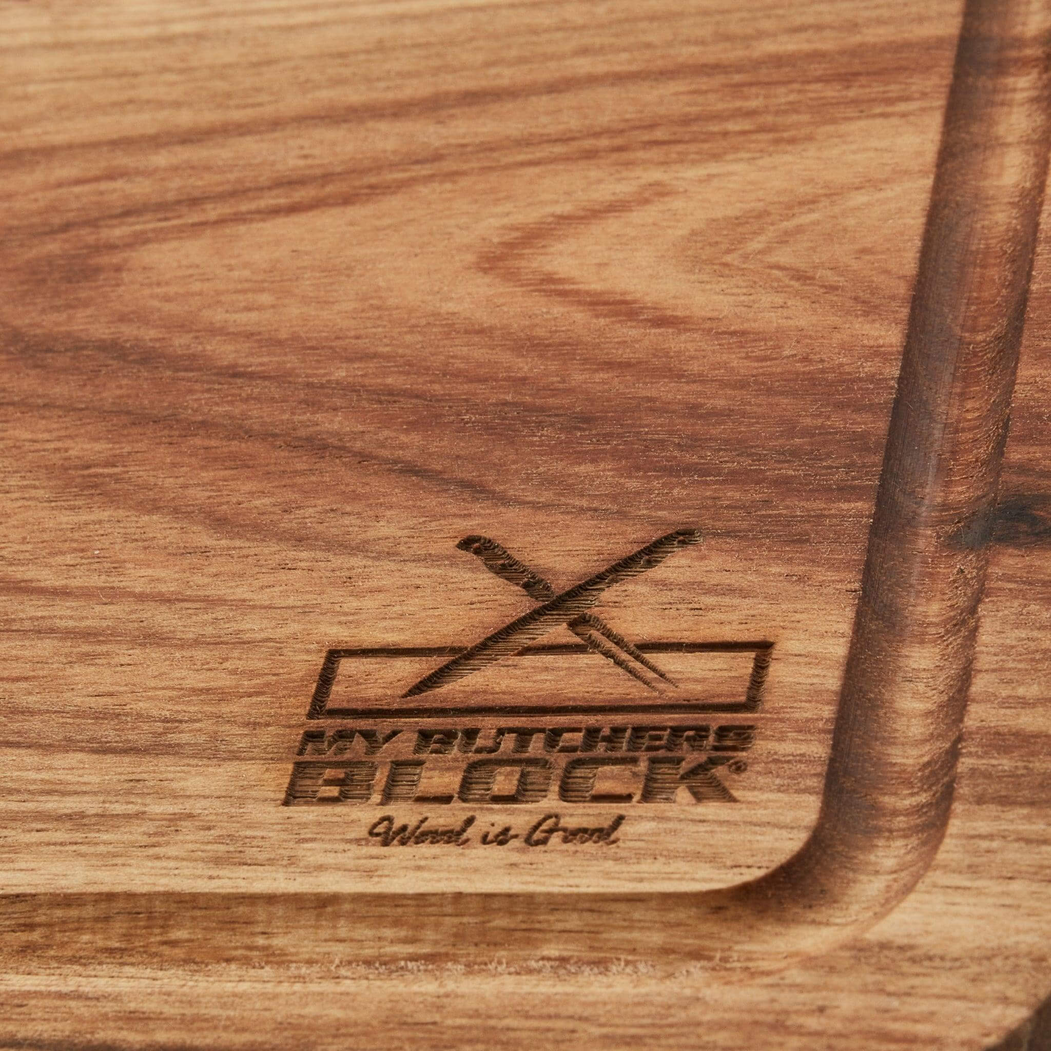 Engraved wooden steak board from My Butcher's Block showcasing quality craftsmanship for ideal steak serving.