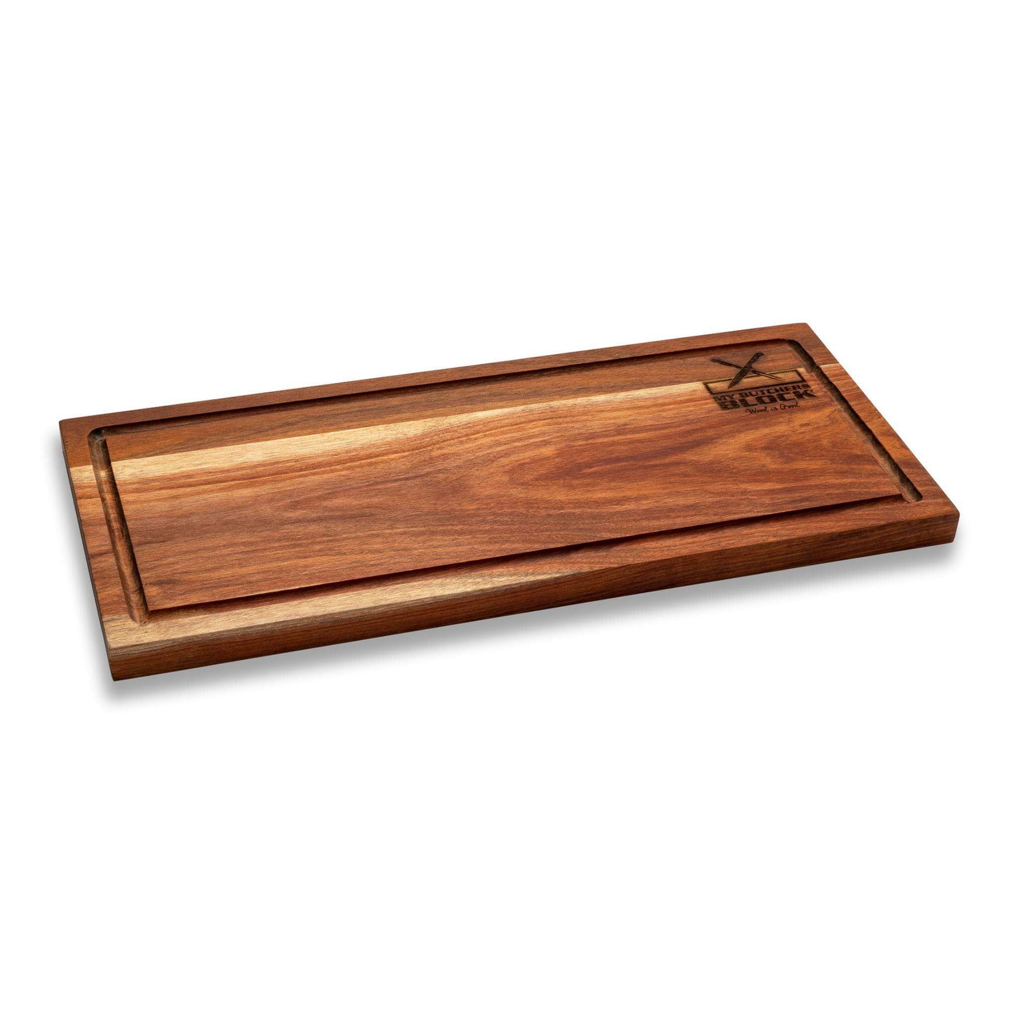 Large wooden steak board with juice groove for slicing and serving meat, perfect for gatherings.