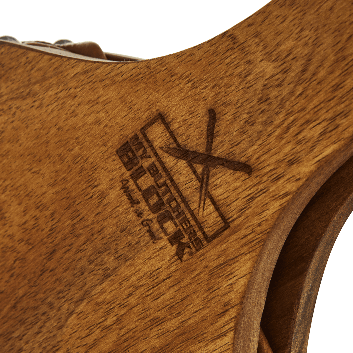 Close-up of the My Butchers Block logo engraved on the wooden part of the Bellow.