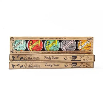 Funky Ouma Travel Salt and Seasoning Taster Kit featuring various spices and salts for flavorful cooking.
