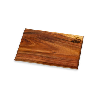 Angled view of the Basic Chopping Board - Small, showing its thickness and smooth finish.