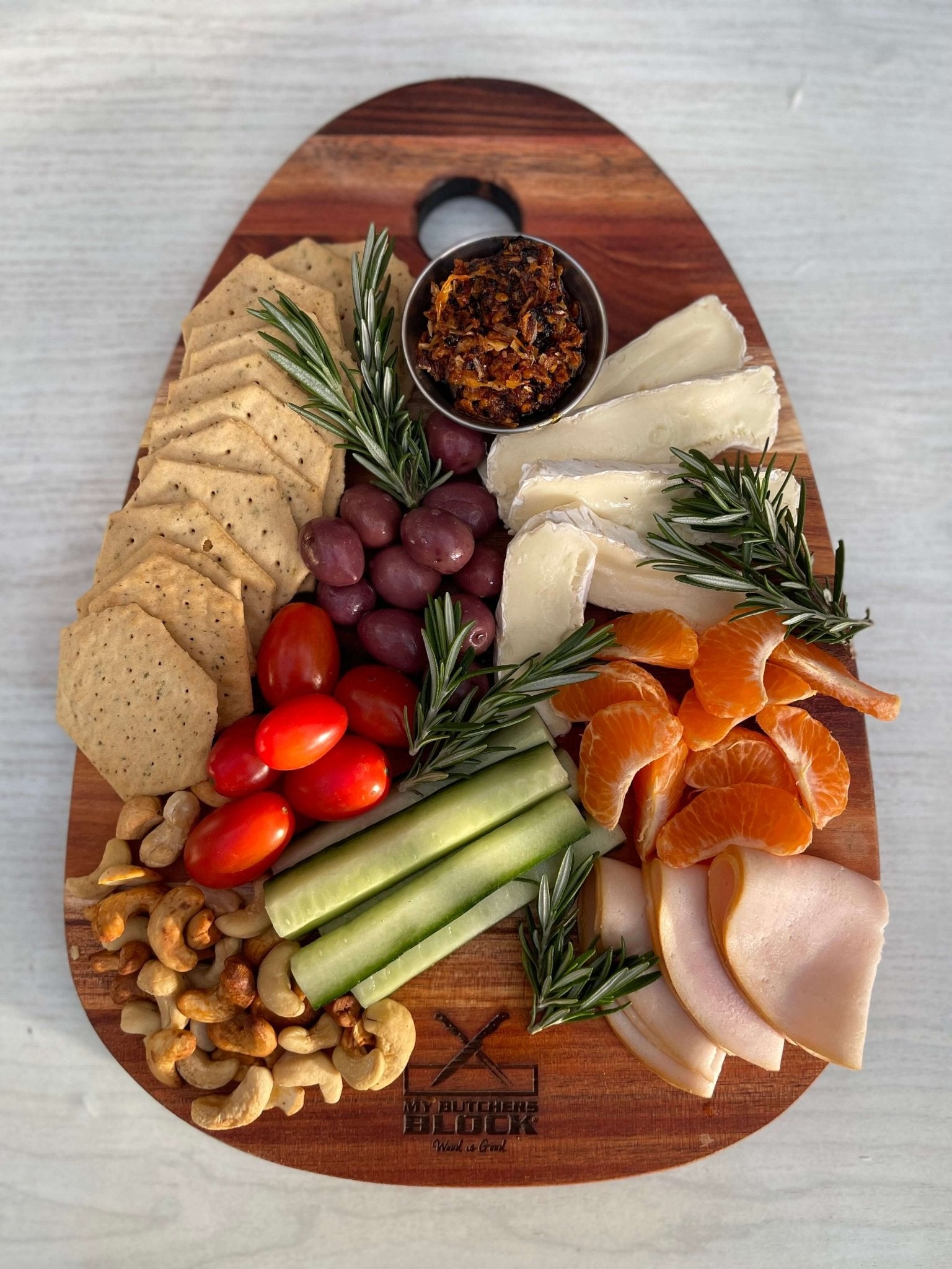 Paddle Board Small Old Design with assorted snacks, cheeses, fruits, and nuts, perfect for hosting and serving