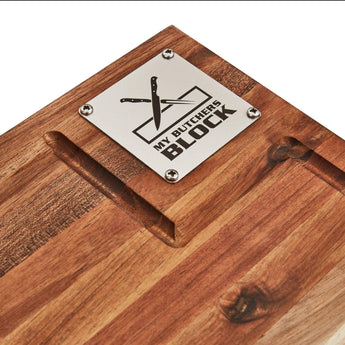 My Butchers Block top view showcasing logo and unique grooves for meat preparation.