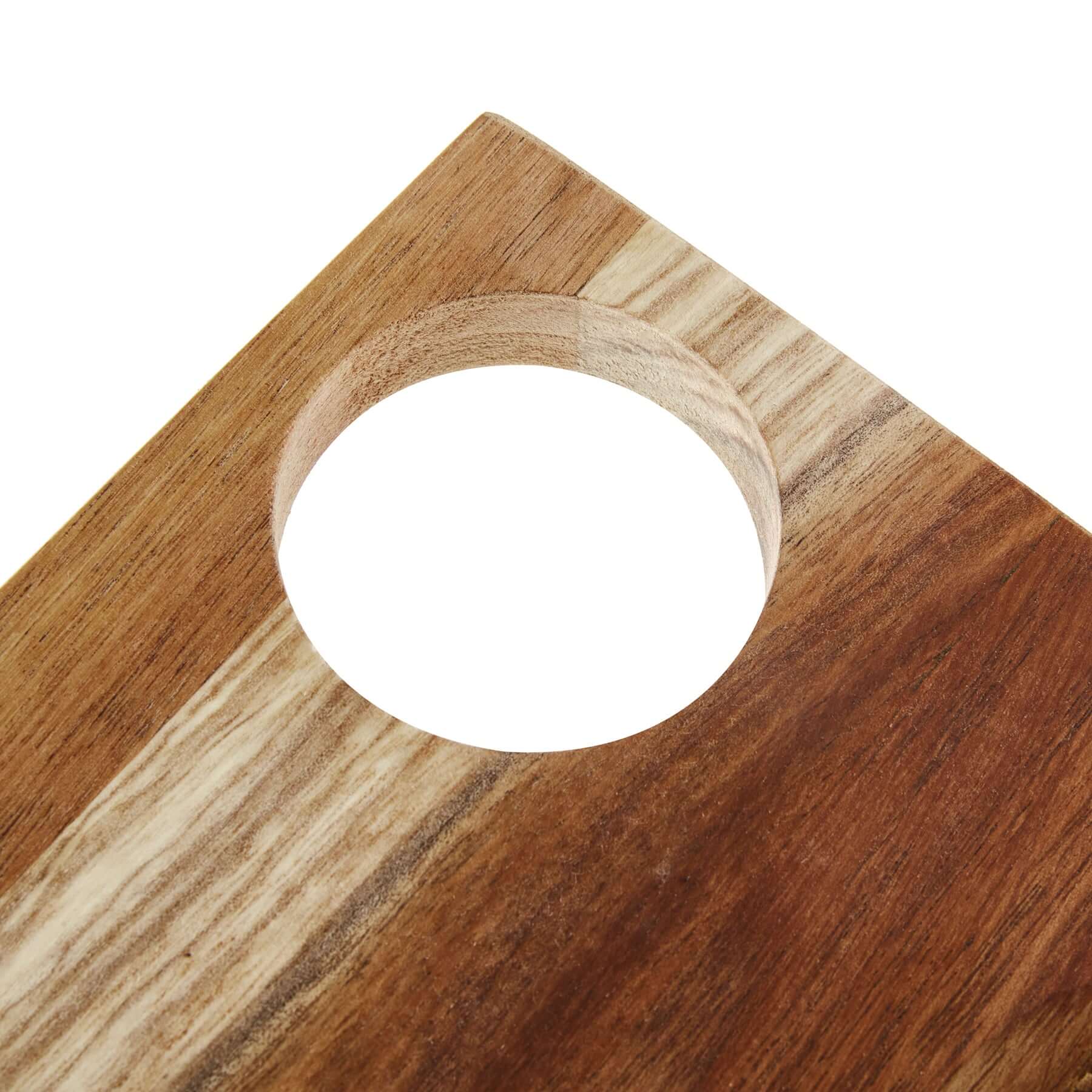 Handy Andy In Black Resin serving board with a circular cutout, showcasing its handmade craftsmanship and elegant design.