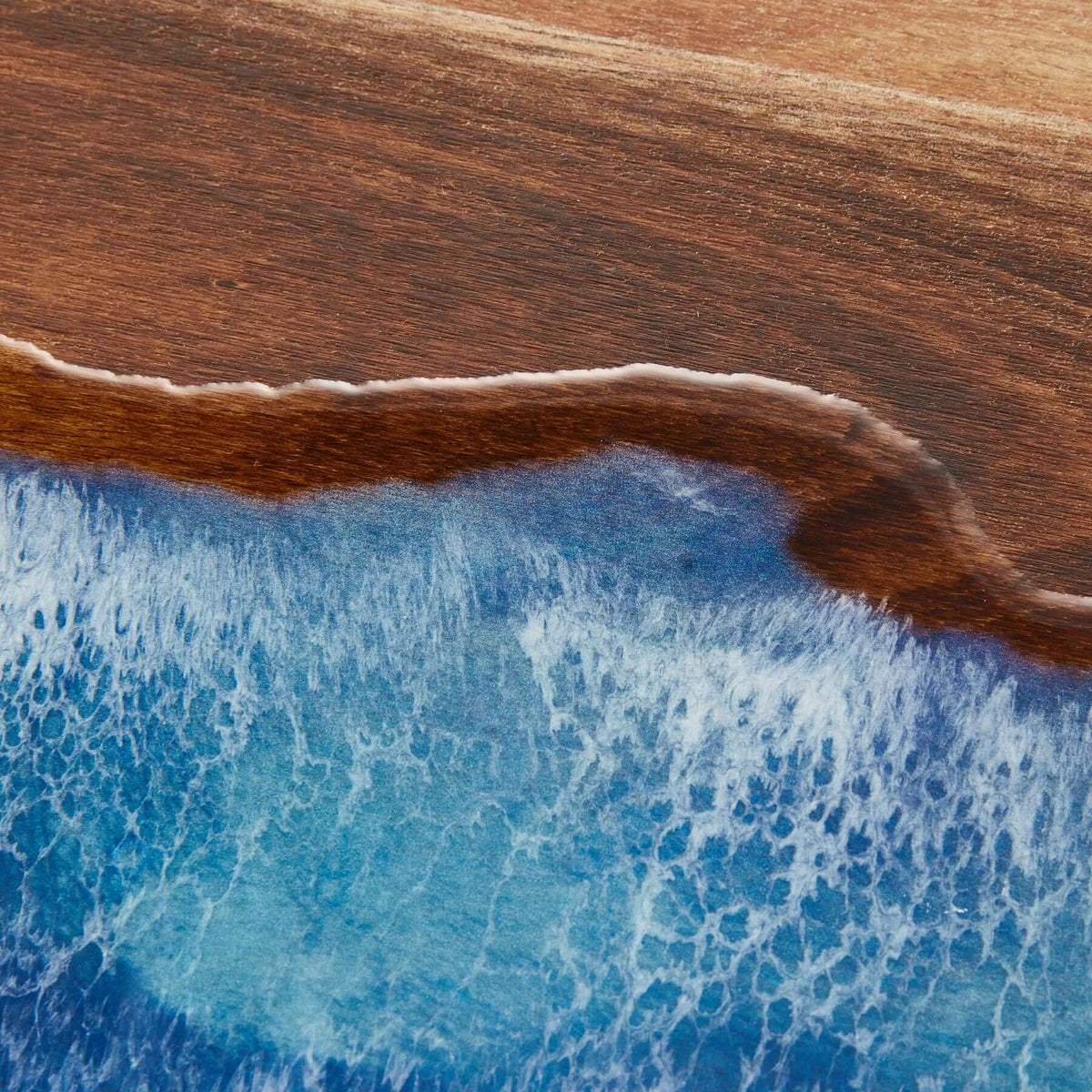 Handy Andy In Blue Resin wooden chopping board with elegant blue resin waves and natural wood finish.