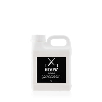 Woodcare Mineral Oil 1L bottle for nourishing and protecting wooden kitchenware.