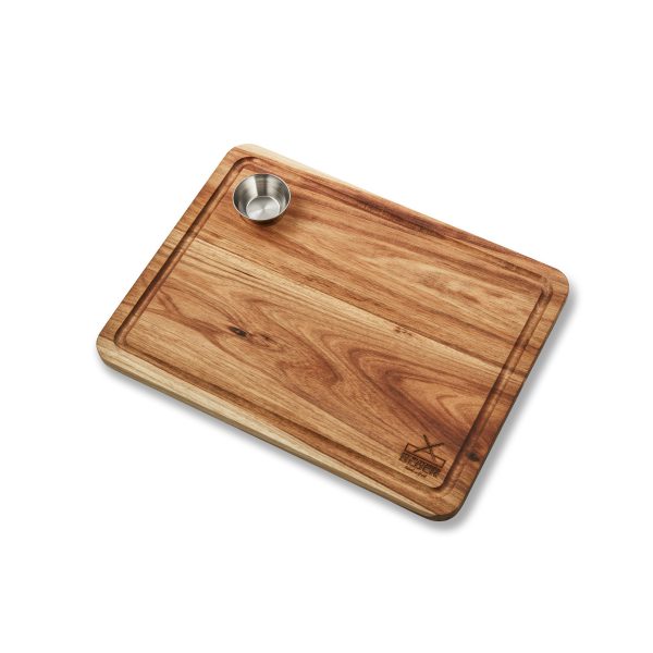 Elegant My Butchers Block Steak Board Large showcasing a variety of grilled meats and sauces, featuring a built-in metal bowl and juice groove for easy serving and cleanup.