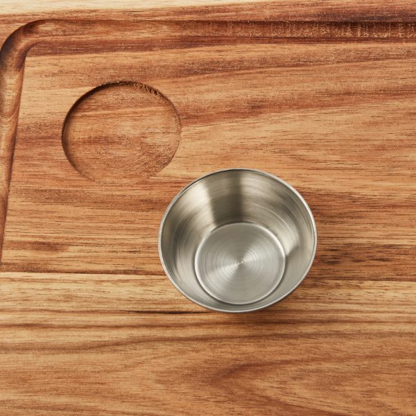 Close-up of the My Butchers Block Steak Board Large highlighting the practical juice groove and built-in metal bowl, crafted from high-quality Acacia wood.